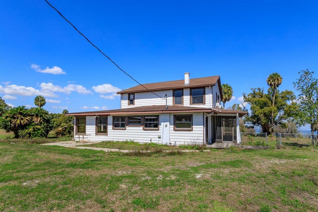 13311 Southeast Sunset Harbor Road Weirsdale, FL 32195 - Photo 2 of 26