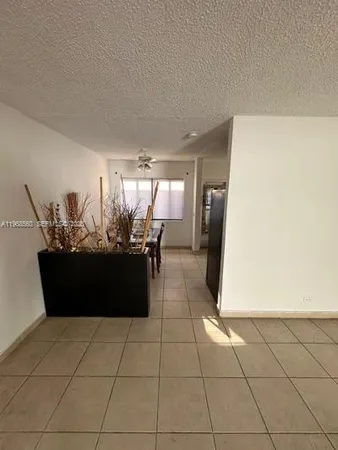a view of a living room with furniture