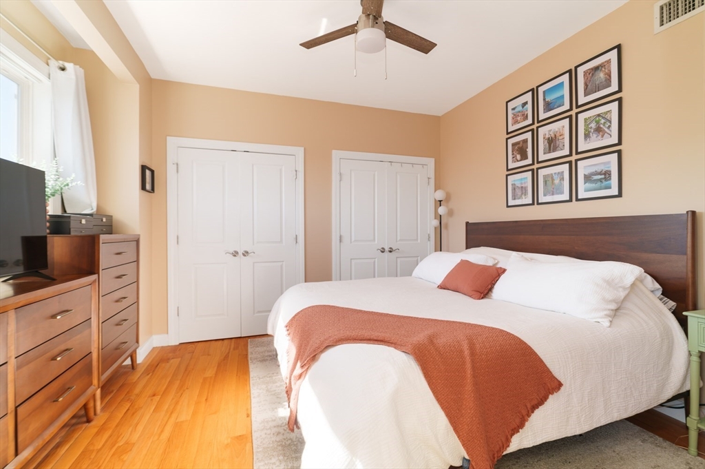 412 Meridian Street, Unit 3 Boston, MA 02128 - Photo 11 of 30 a bedroom with a bed and a dresser