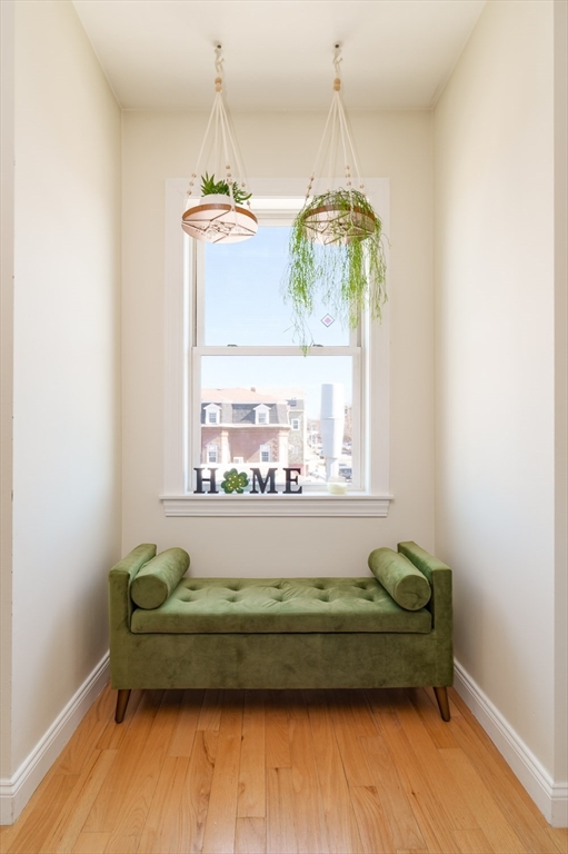 412 Meridian Street, Unit 3 Boston, MA 02128 - Photo 20 of 30 a bathroom with a granite countertop sink and a window