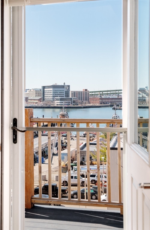 412 Meridian Street, Unit 3 Boston, MA 02128 - Photo 23 of 30 a view of a balcony with city view