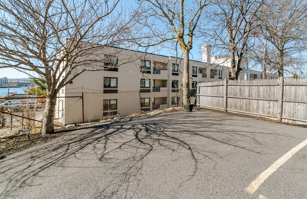 412 Meridian Street, Unit 3 Boston, MA 02128 - Photo 29 of 30 a view of a house with a snow