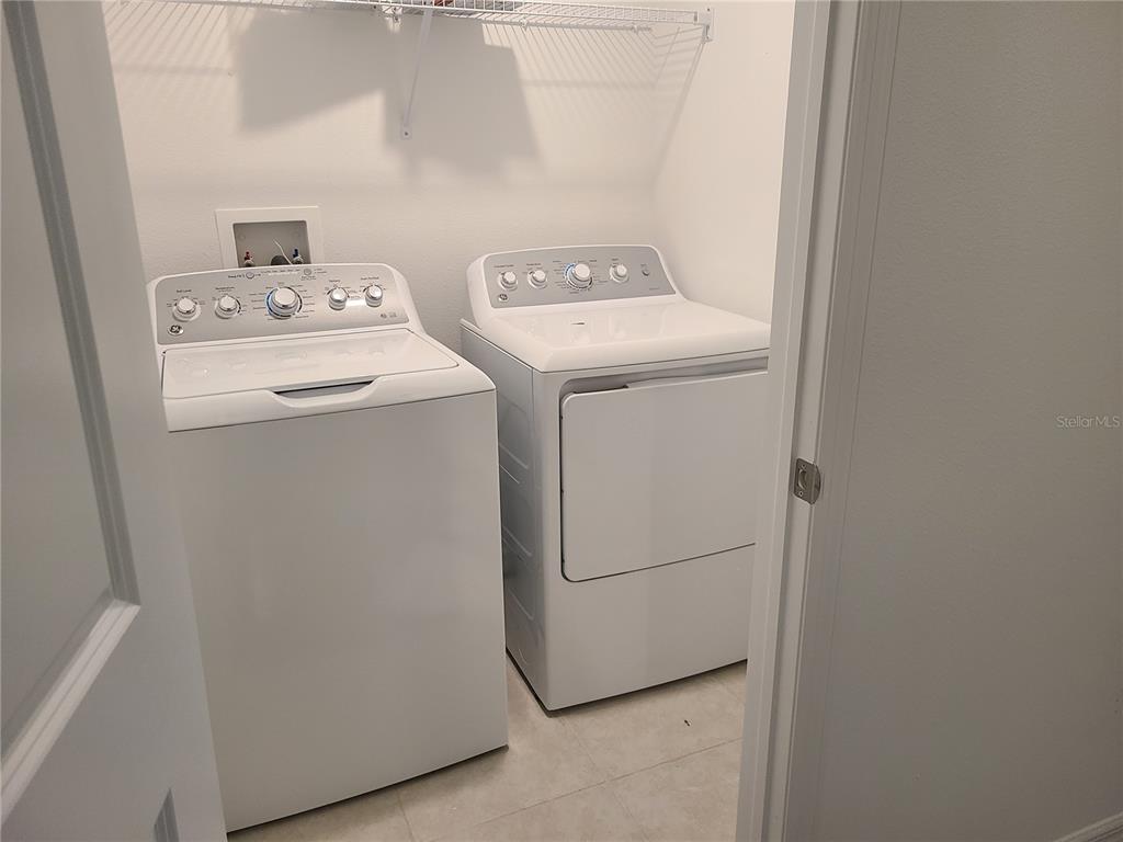 14349 Editors Note Street Ruskin, FL 33573 - Photo 14 of 20 a utility room with dryer and washer