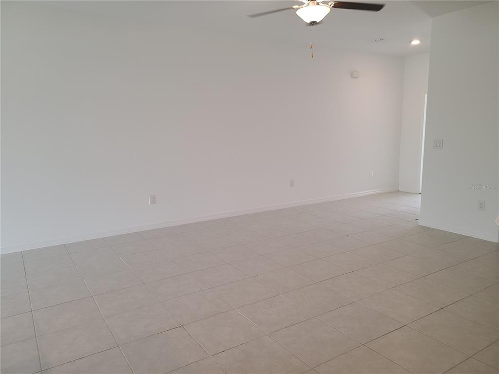 14349 Editors Note Street Ruskin, FL 33573 - Photo 9 of 20 a view of an empty room