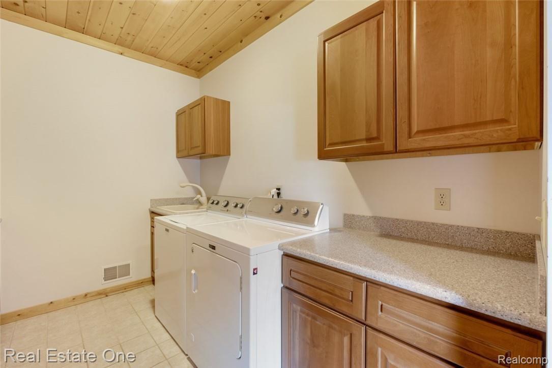 9485 Henderson Road Goodrich, MI 48438 - Photo 27 of 50 FIRST FLOOR LAUNDRY ROOM NEW APPLIANCES INCLUDED