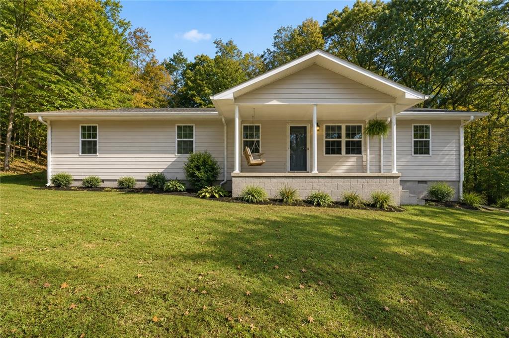 front view of a house with a yard