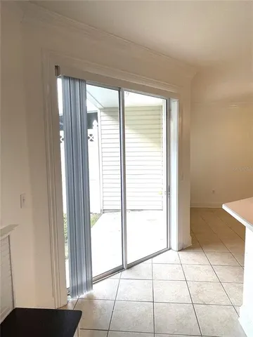 a view of a closet area with hardwood floor