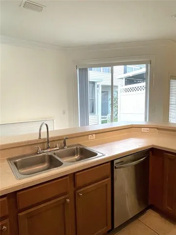 a bathroom with a tub a sink and mirror