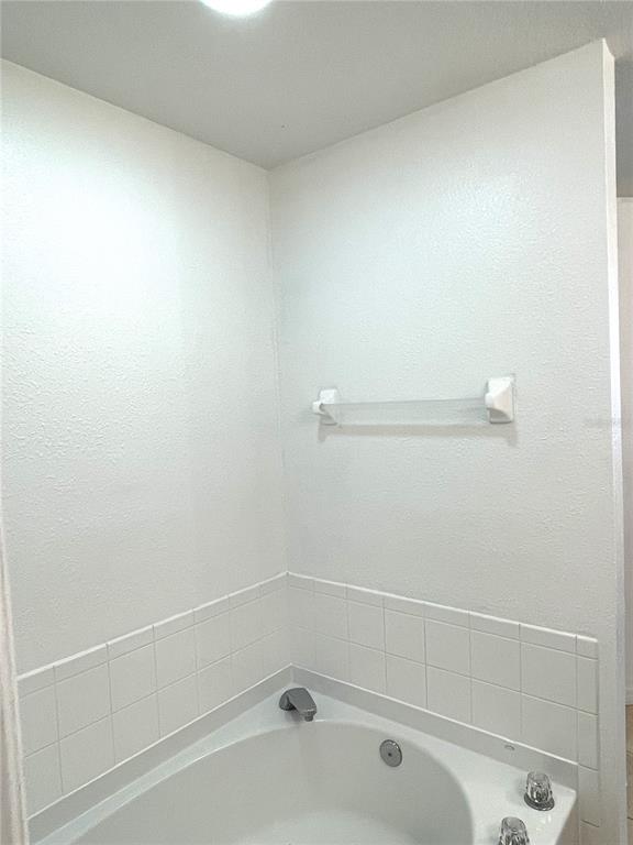 4282 Morton Court Lakeland, FL 33813 - Photo 33 of 72 a close up of a bathtub