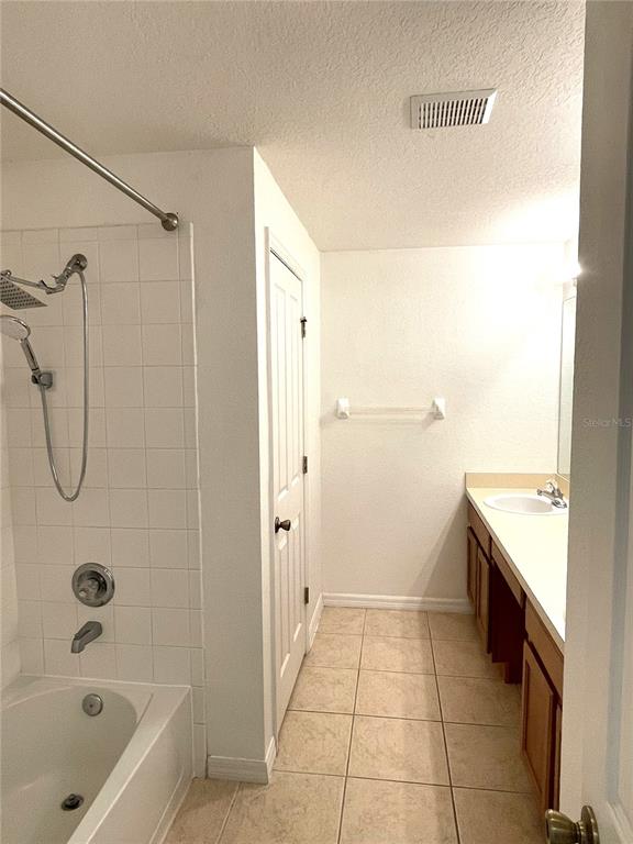 4282 Morton Court Lakeland, FL 33813 - Photo 37 of 72 a bathroom with a bathtub and a shower