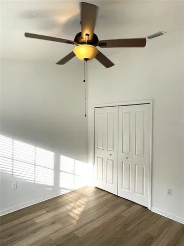 a front view of a house having glass doors