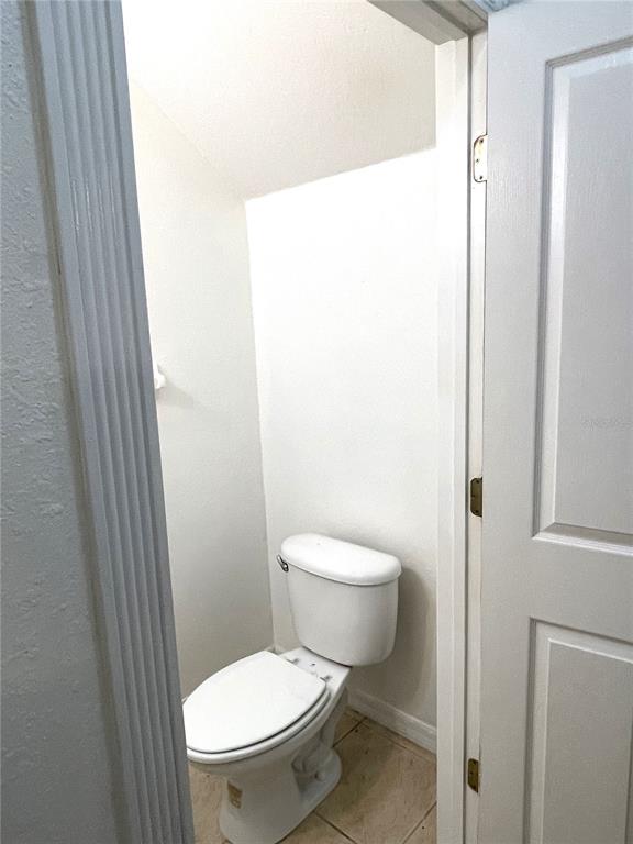 4282 Morton Court Lakeland, FL 33813 - Photo 52 of 72 a white toilet sitting next to a shower