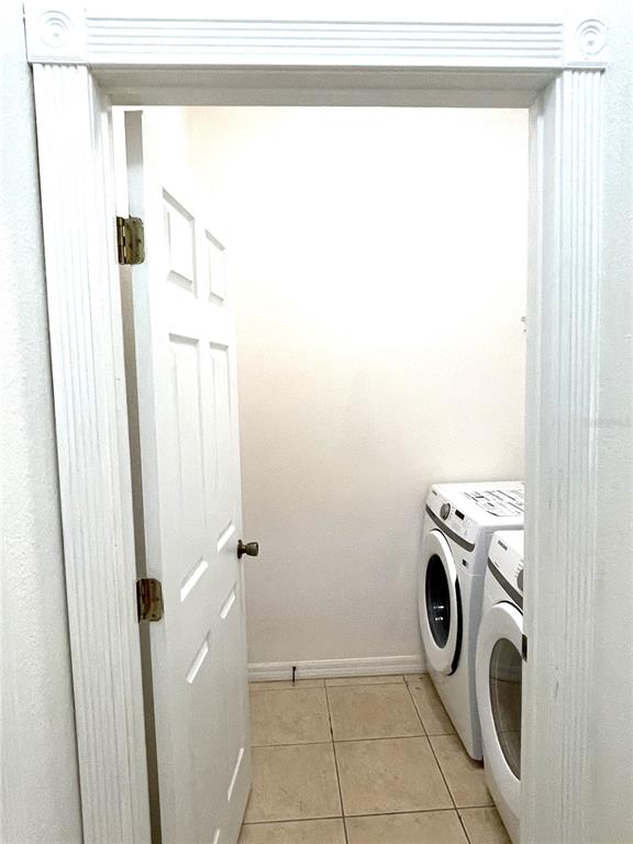 4282 Morton Court Lakeland, FL 33813 - Photo 54 of 72 a utility room with dryer and washer