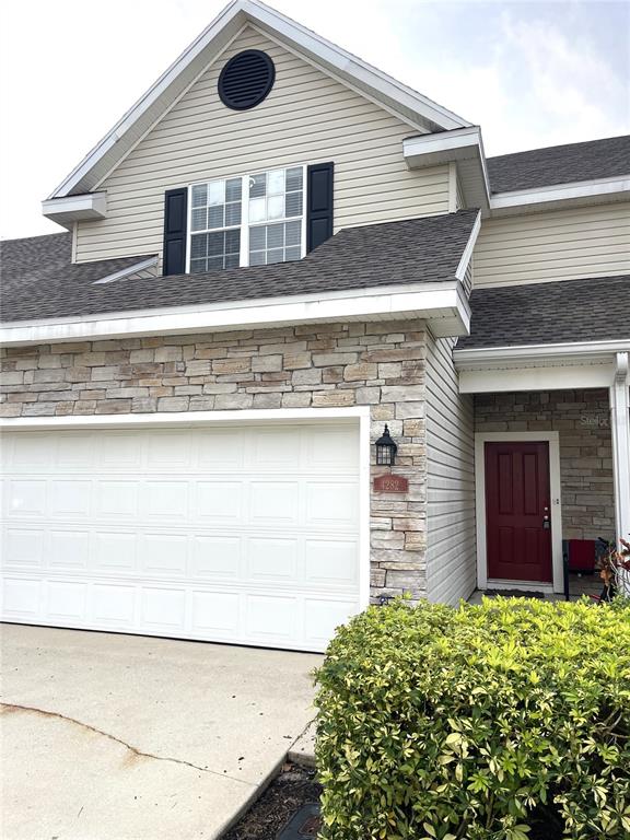 4282 Morton Court Lakeland, FL 33813 - Photo 59 of 72 a front view of a house with yard