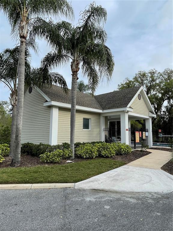 4282 Morton Court Lakeland, FL 33813 - Photo 62 of 72 a front view of a house with a garden