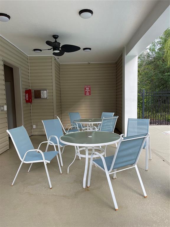 4282 Morton Court Lakeland, FL 33813 - Photo 65 of 72 a dining room with furniture and a window
