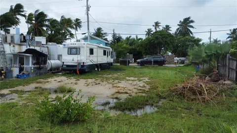 a view of a lake with boats