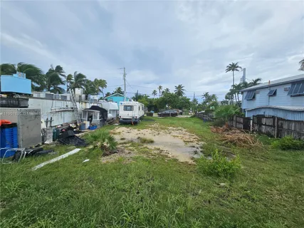 a view of a lake with sitting area