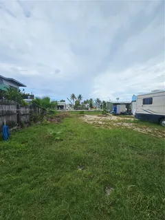 a view of a street with cars