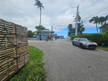 a view of a street with of houses