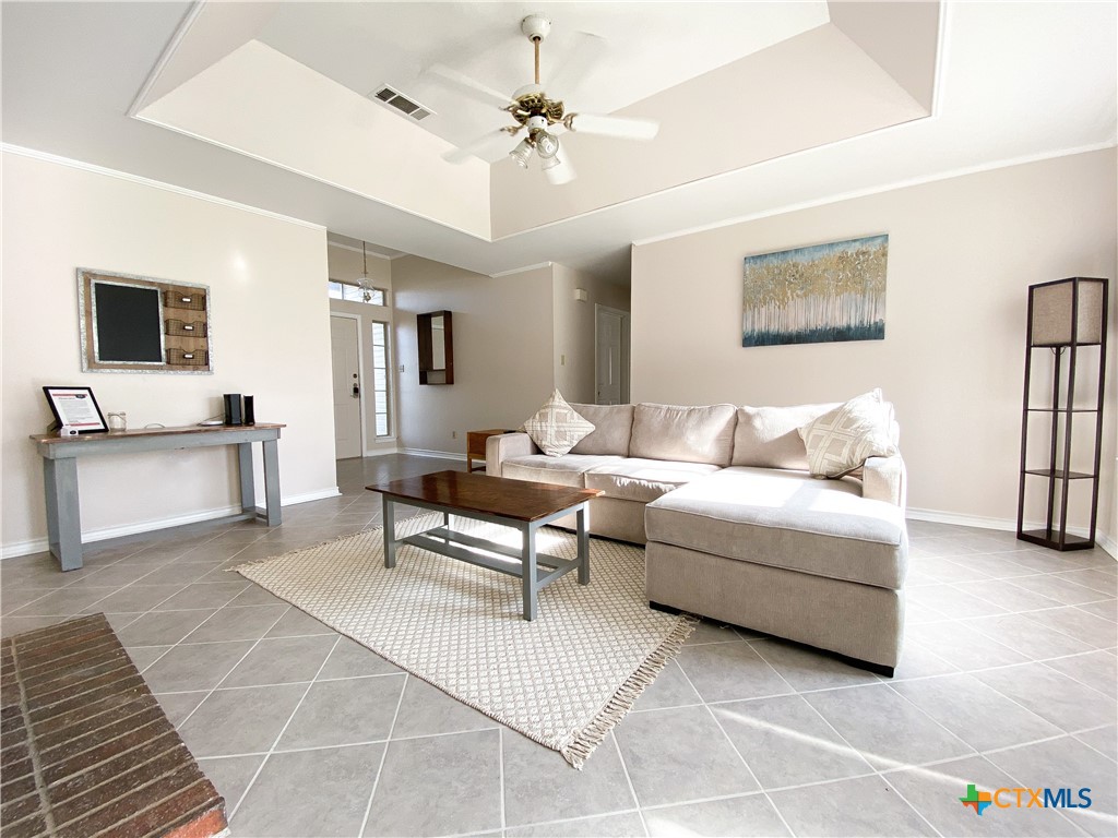 2703 Larkspur Drive Killeen, TX 76549 - Photo 4 of 17 a living room with furniture and a flat screen tv