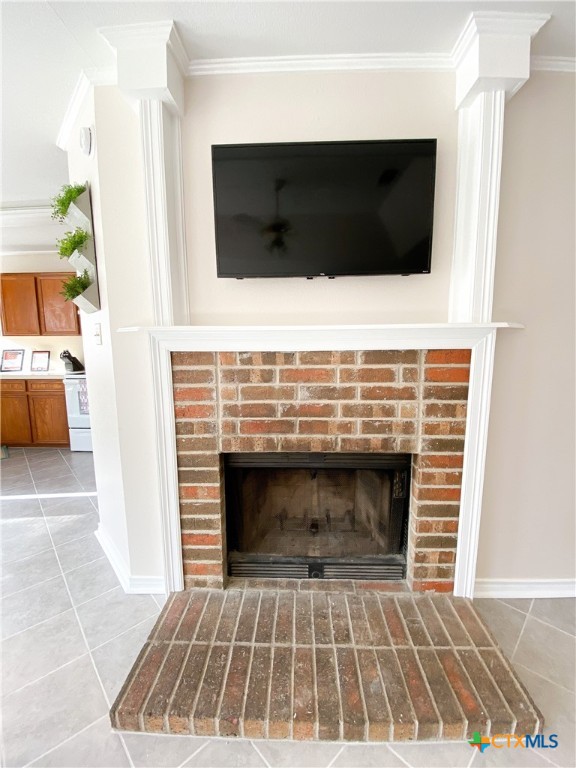 2703 Larkspur Drive Killeen, TX 76549 - Photo 5 of 17 a living room with a fireplace and a flat screen tv
