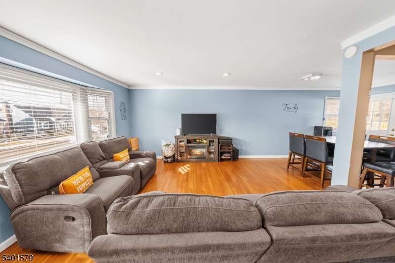 2563 Jackson Avenue Union, NJ 07083 - Photo 5 of 39 a living room with furniture and a flat screen tv
