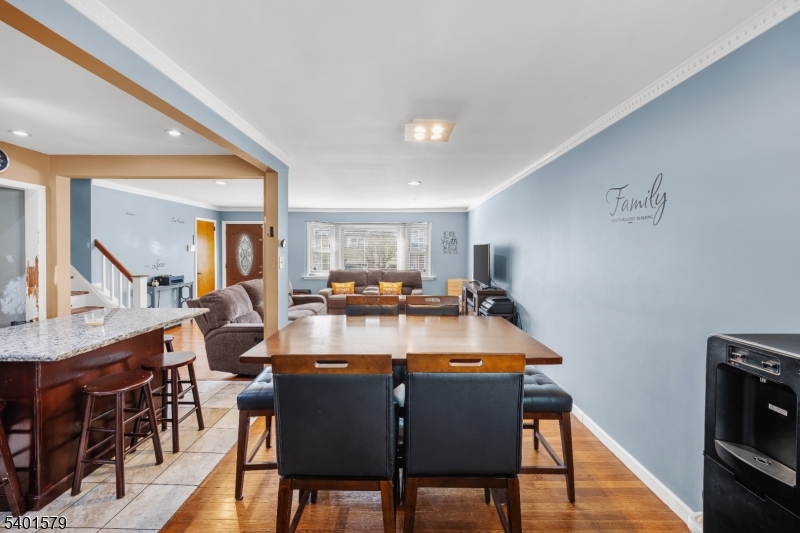 2563 Jackson Avenue Union, NJ 07083 - Photo 10 of 39 a view of a dining room with furniture and wooden floor