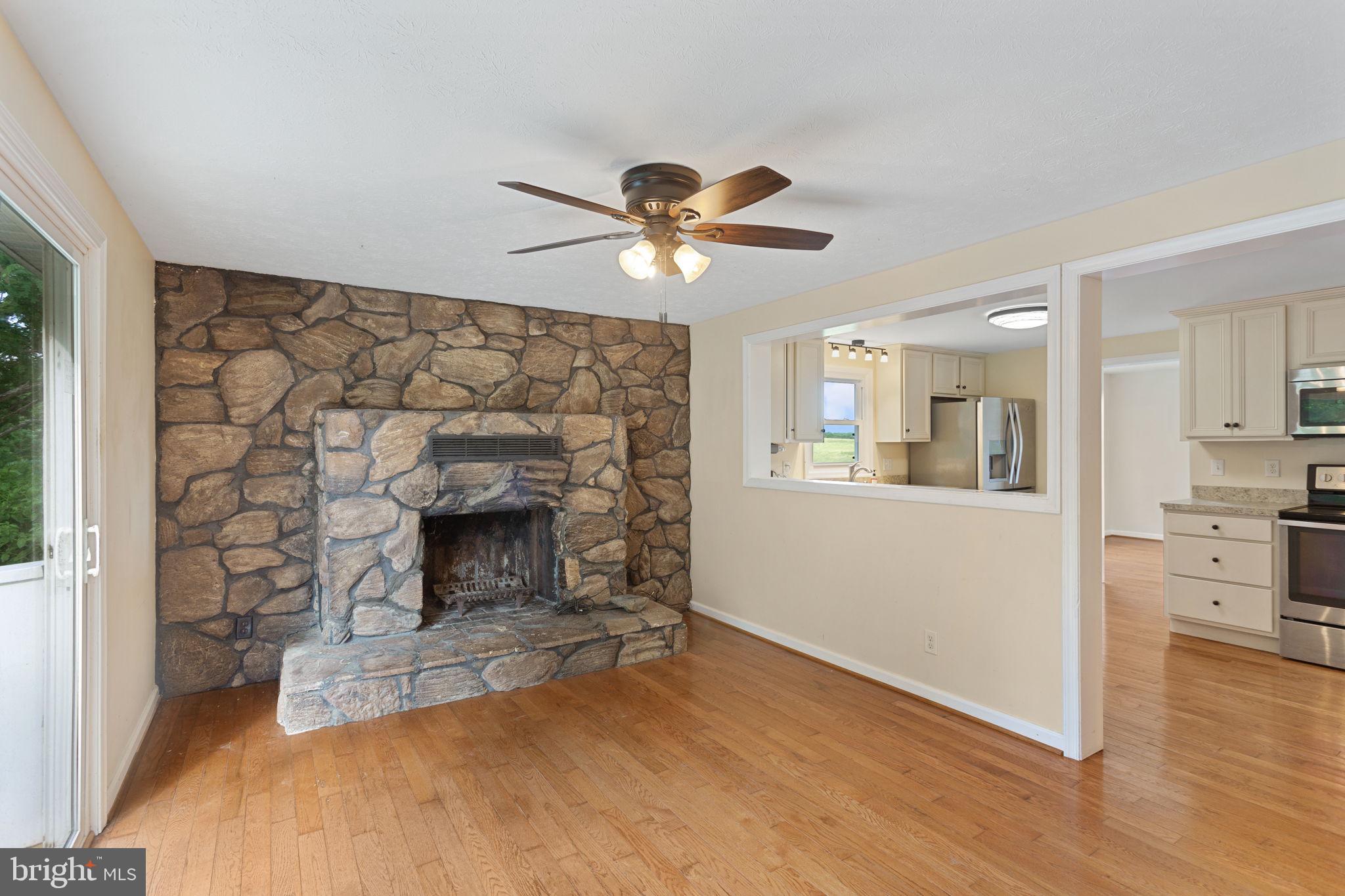 1919 Ridge Road New Market, VA 22844 - Photo 2 of 24 Den with stone fireplace!