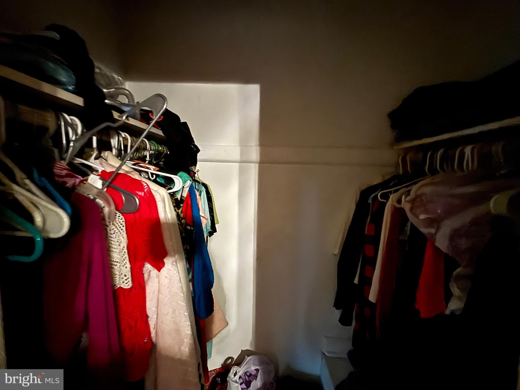 7552 Rabon Avenue Baltimore, MD 21222 - Photo 17 of 39 a view of walk in closet with clothes and shoes