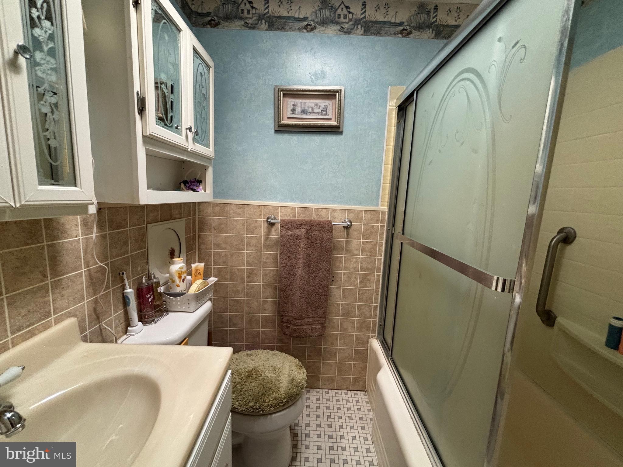 7552 Rabon Avenue Baltimore, MD 21222 - Photo 20 of 39 a bathroom with a sink and a mirror