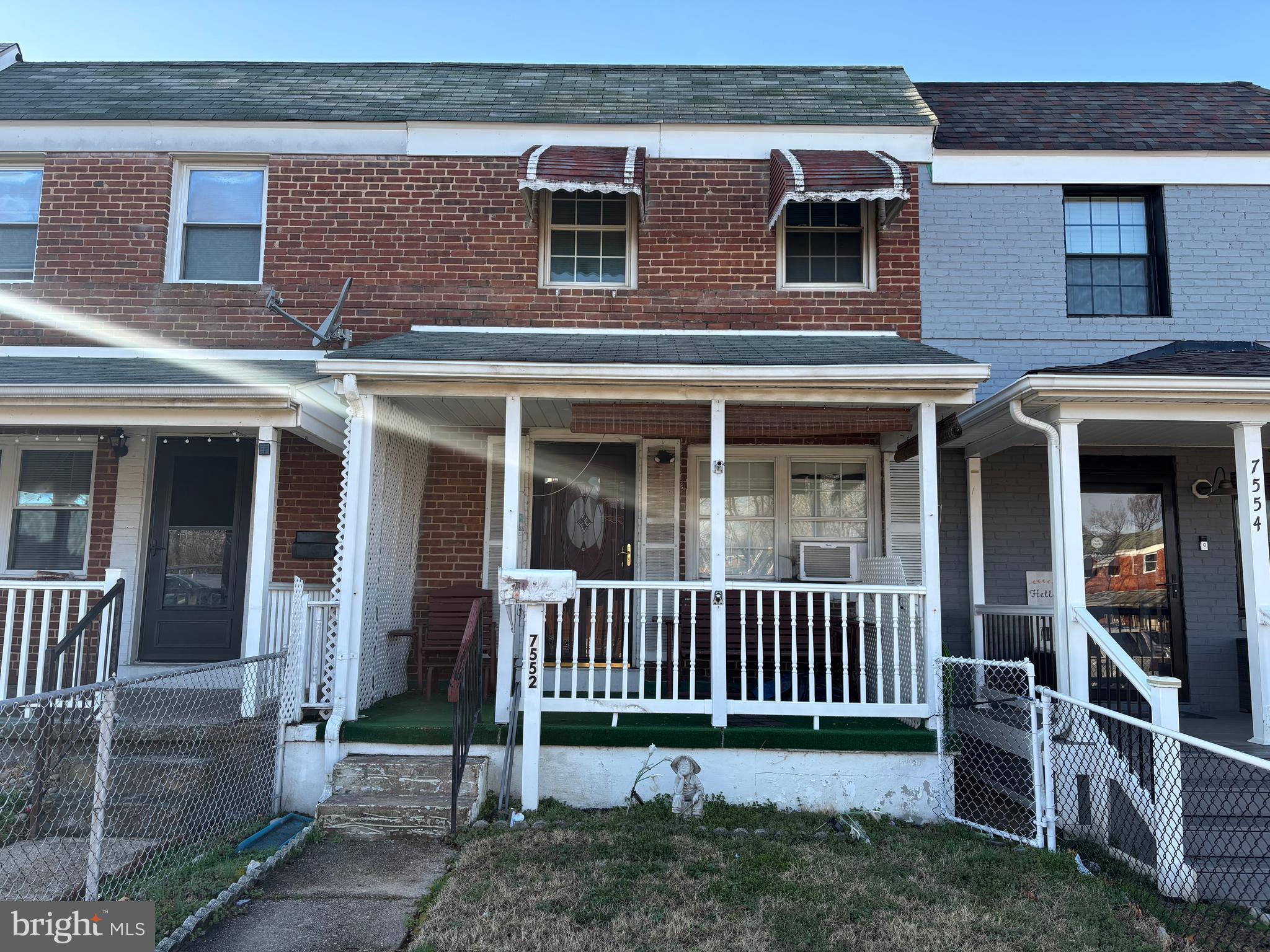 7552 Rabon Avenue Baltimore, MD 21222 - Photo 2 of 39 front view of a house with a porch
