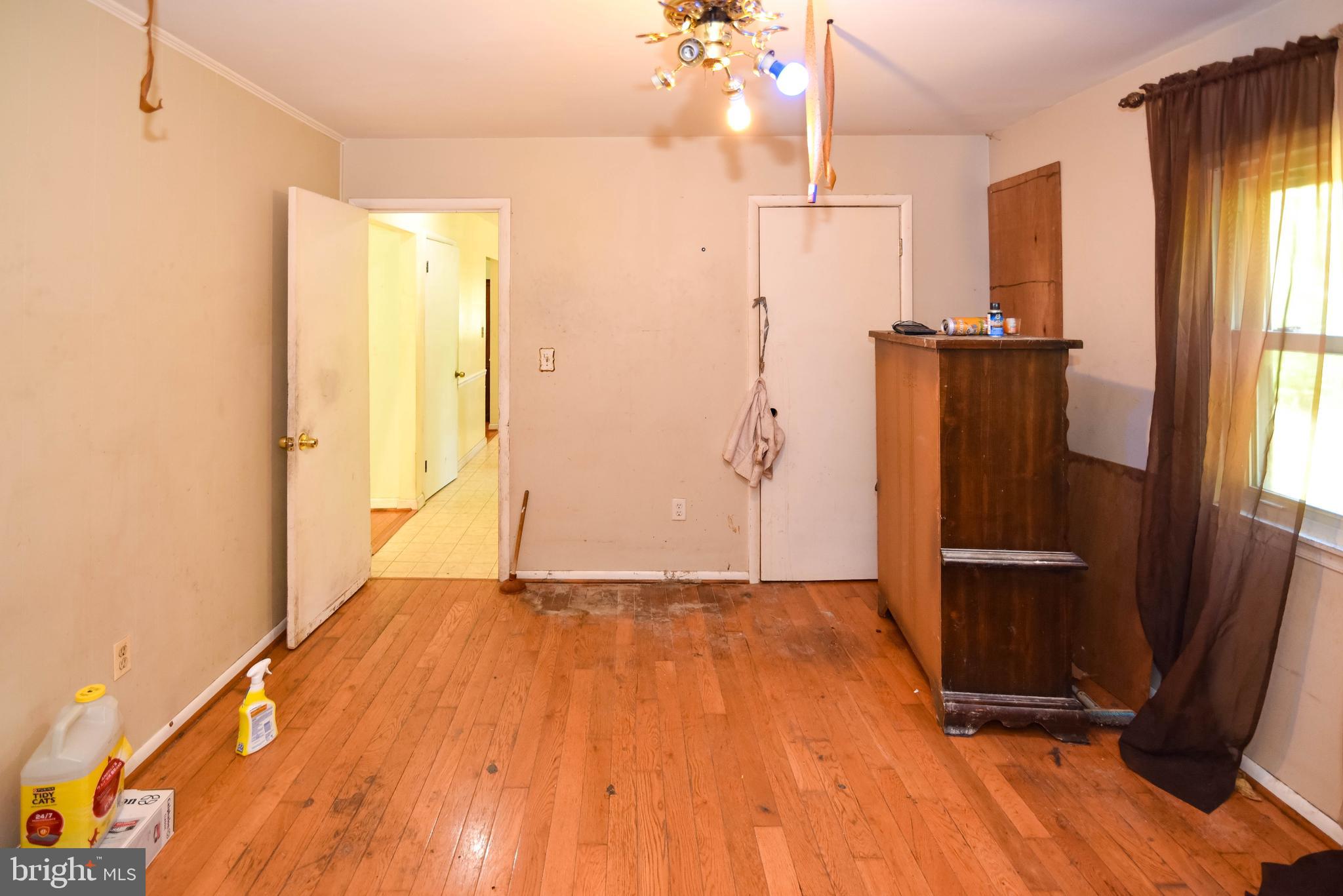 1204 Dicus Mill Road Millersville, MD 21108 - Photo 15 of 63 a view of a kitchen with wooden floor and a window