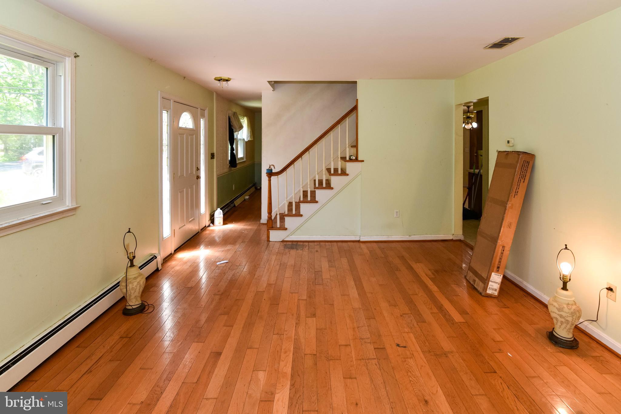 1204 Dicus Mill Road Millersville, MD 21108 - Photo 2 of 63 a view of entryway with wooden floor