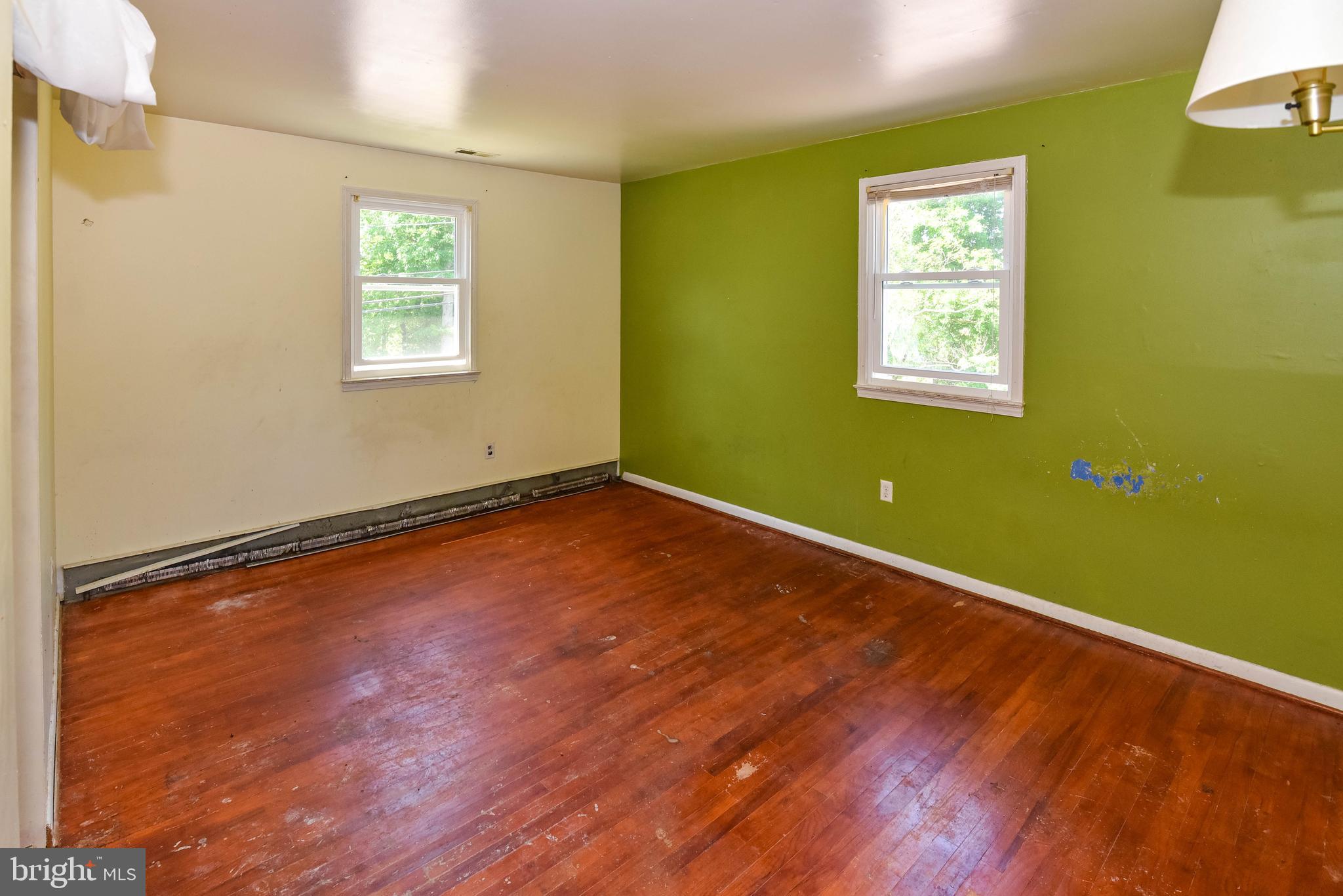 1204 Dicus Mill Road Millersville, MD 21108 - Photo 27 of 63 a view of a room with wooden floor and windows