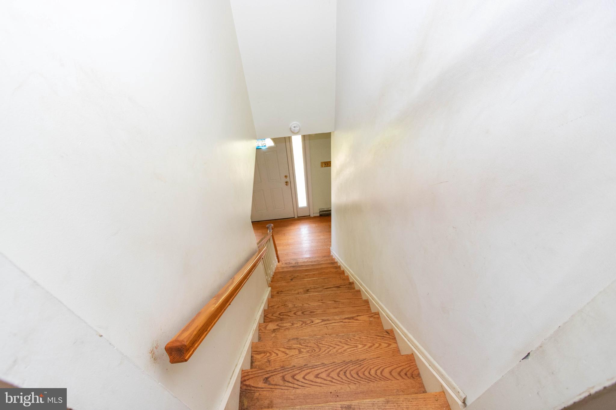 1204 Dicus Mill Road Millersville, MD 21108 - Photo 29 of 63 a view of a hallway with wooden floor