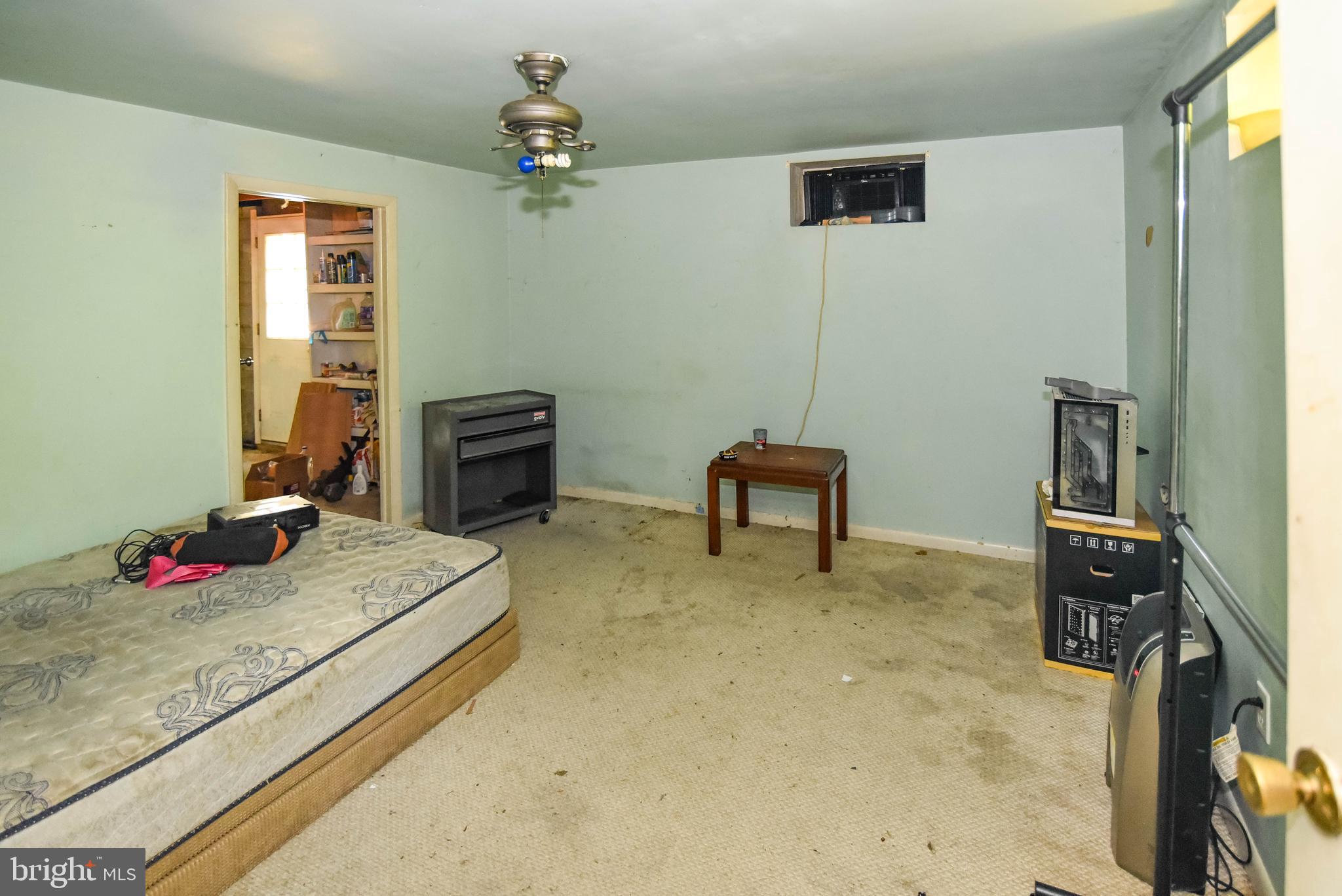 1204 Dicus Mill Road Millersville, MD 21108 - Photo 32 of 63 a bed room with a bed and a desk