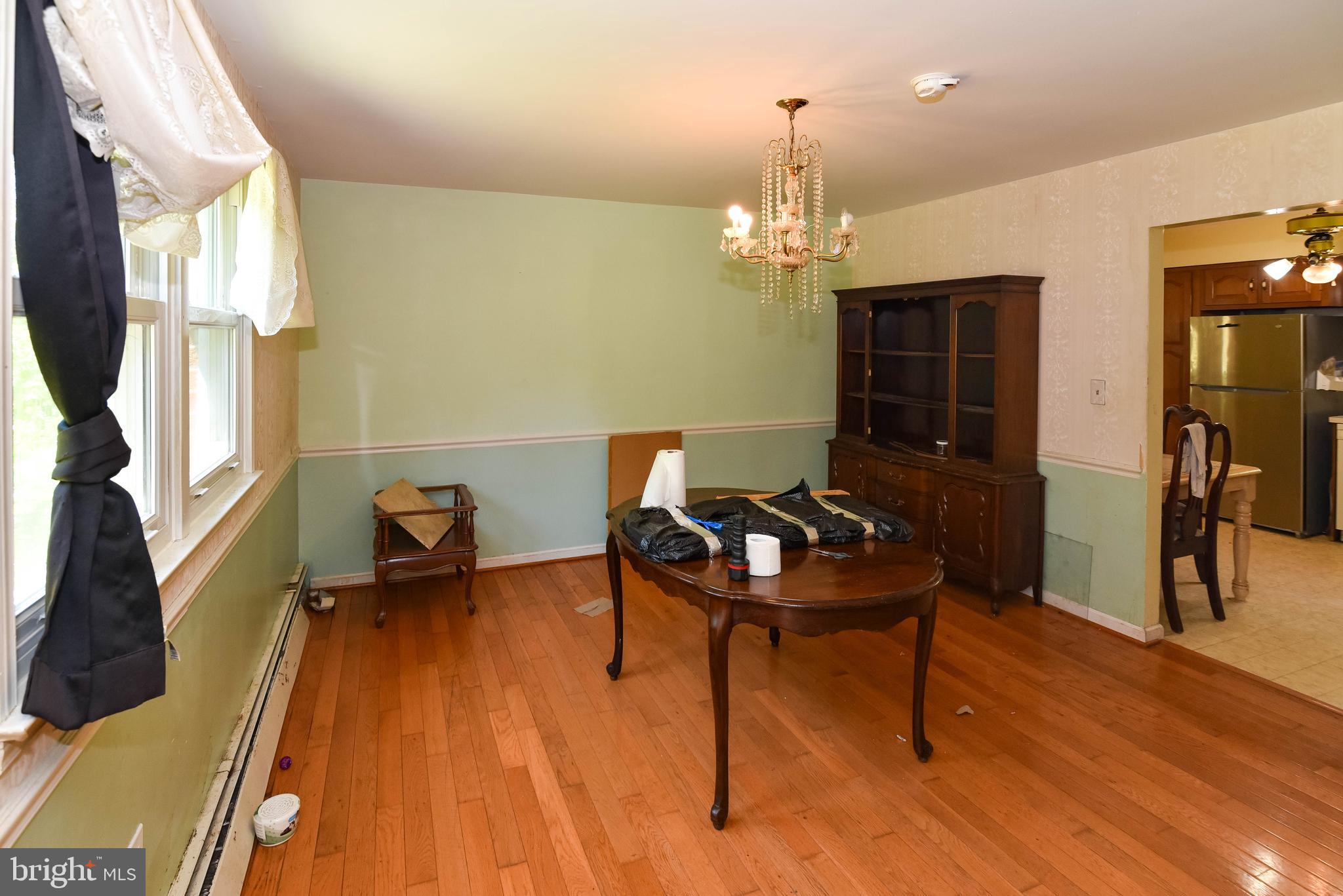 1204 Dicus Mill Road Millersville, MD 21108 - Photo 4 of 63 a reading room with furniture window and wooden floor