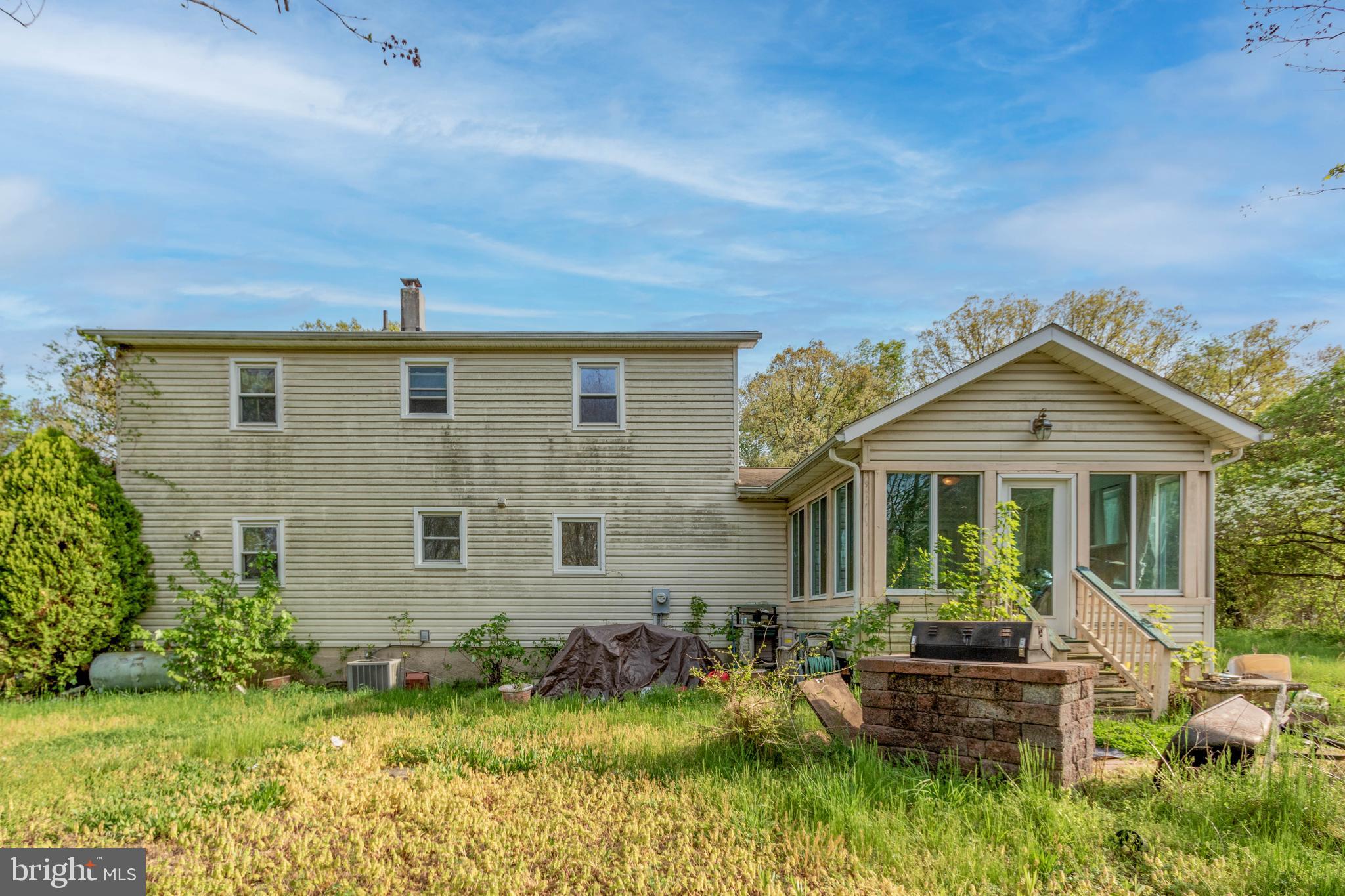 1204 Dicus Mill Road Millersville, MD 21108 - Photo 49 of 63 front view of a house with a yard