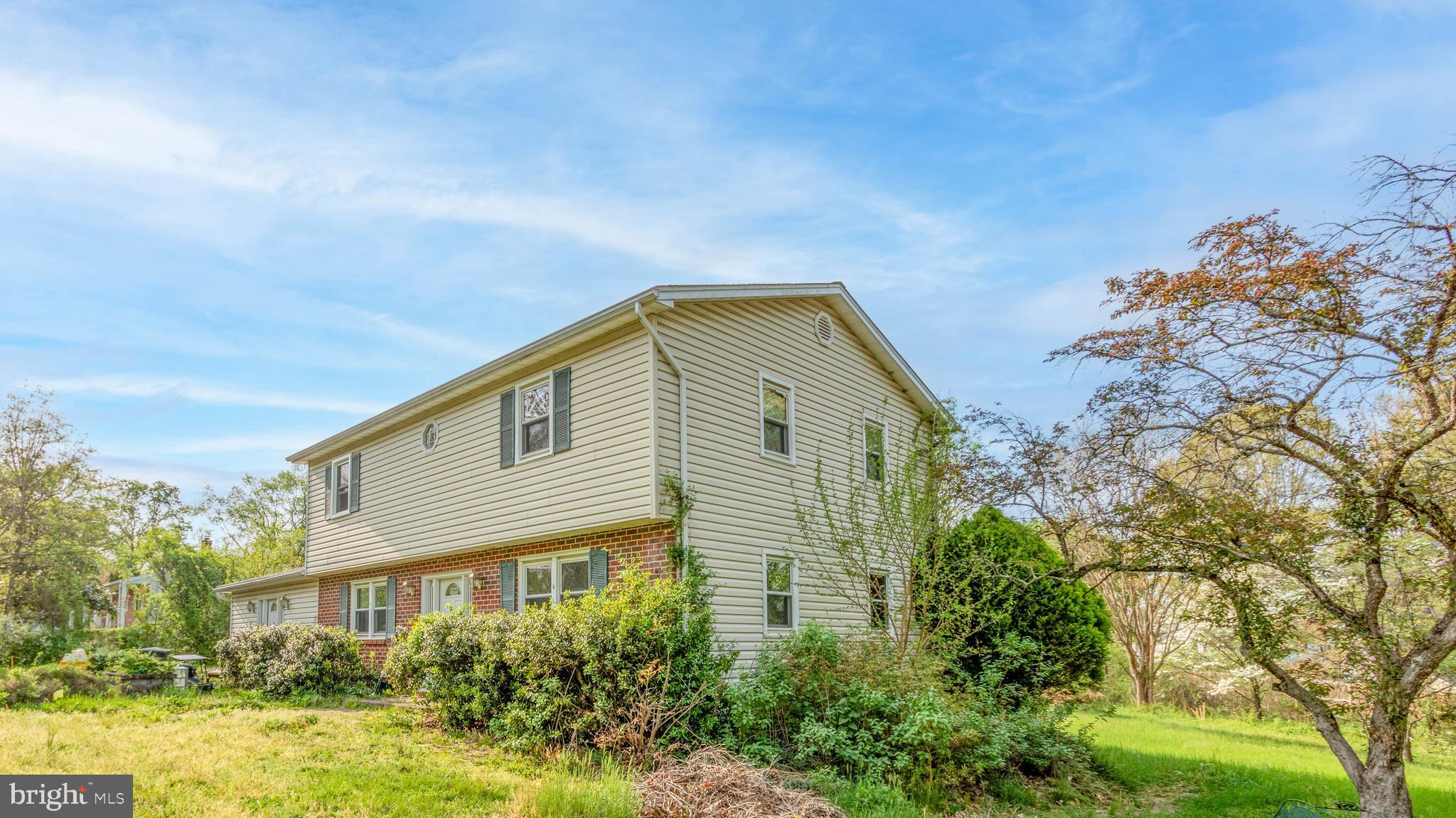 1204 Dicus Mill Road Millersville, MD 21108 - Photo 54 of 63 a view of a house with a yard
