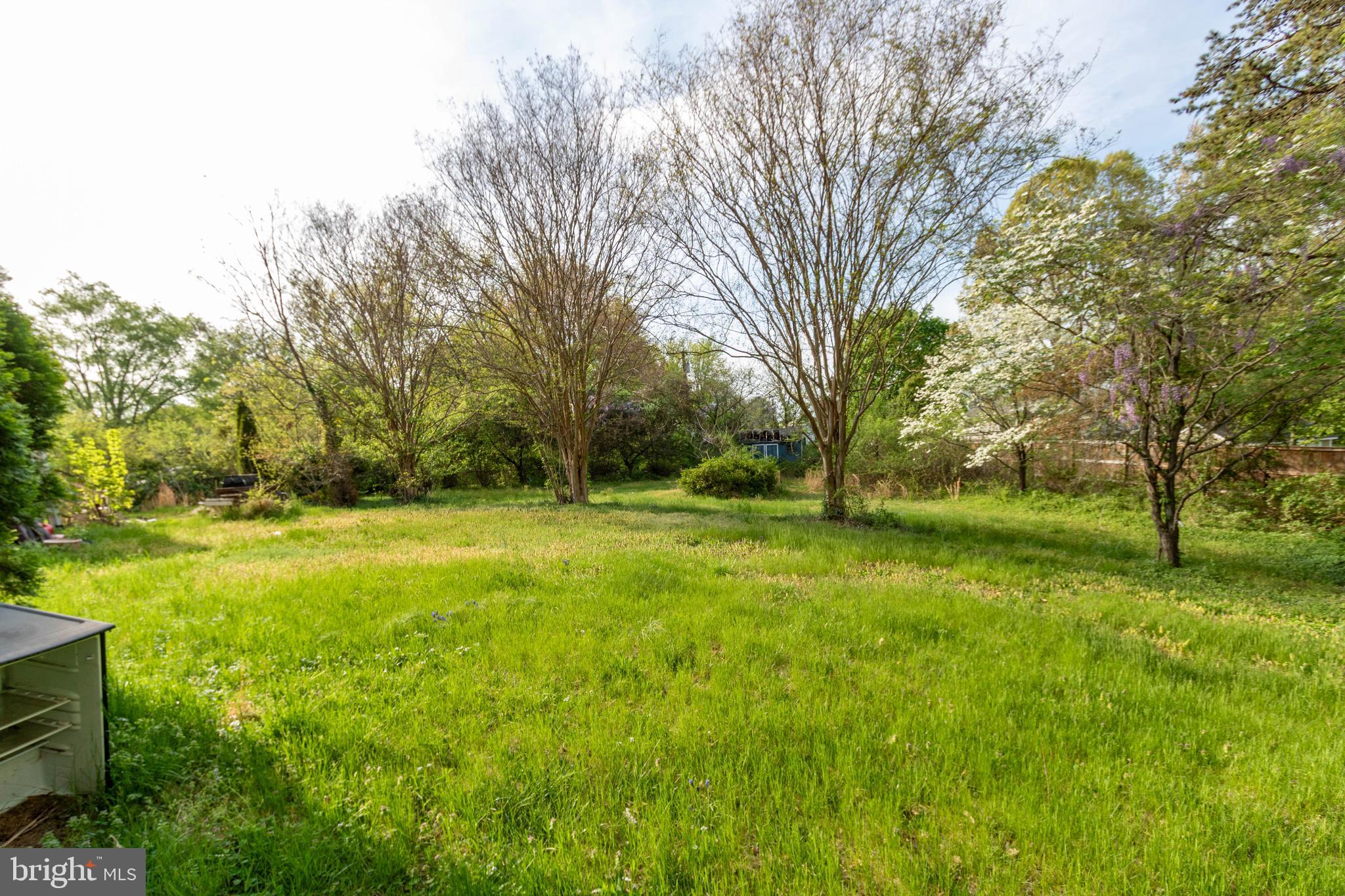 1204 Dicus Mill Road Millersville, MD 21108 - Photo 55 of 63 a view of outdoor space with deck and trees