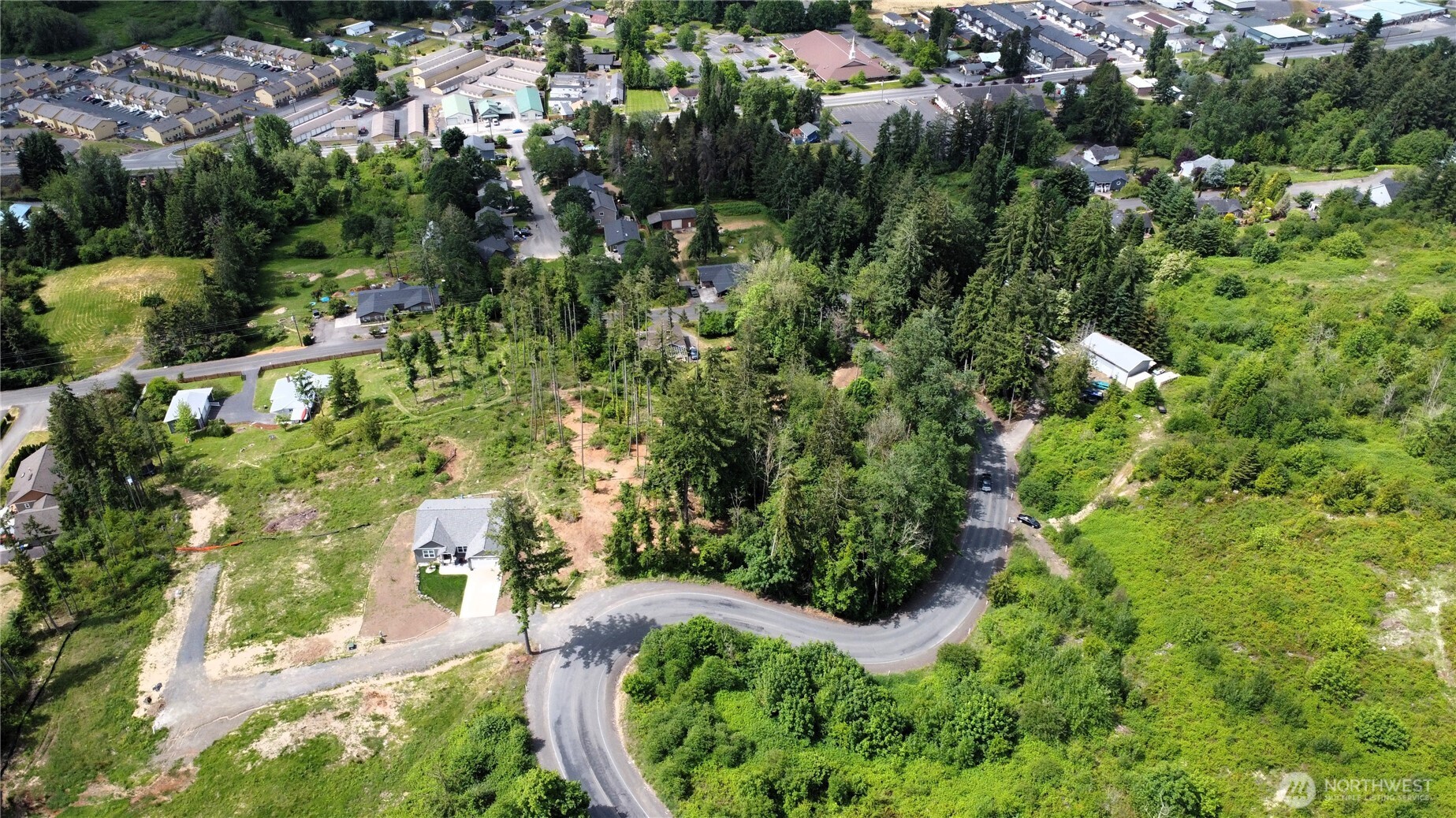 118 Tillicum Drive Chehalis, WA 98532 - Photo 1 of 21 an aerial view of residential house with outdoor space and trees all around
