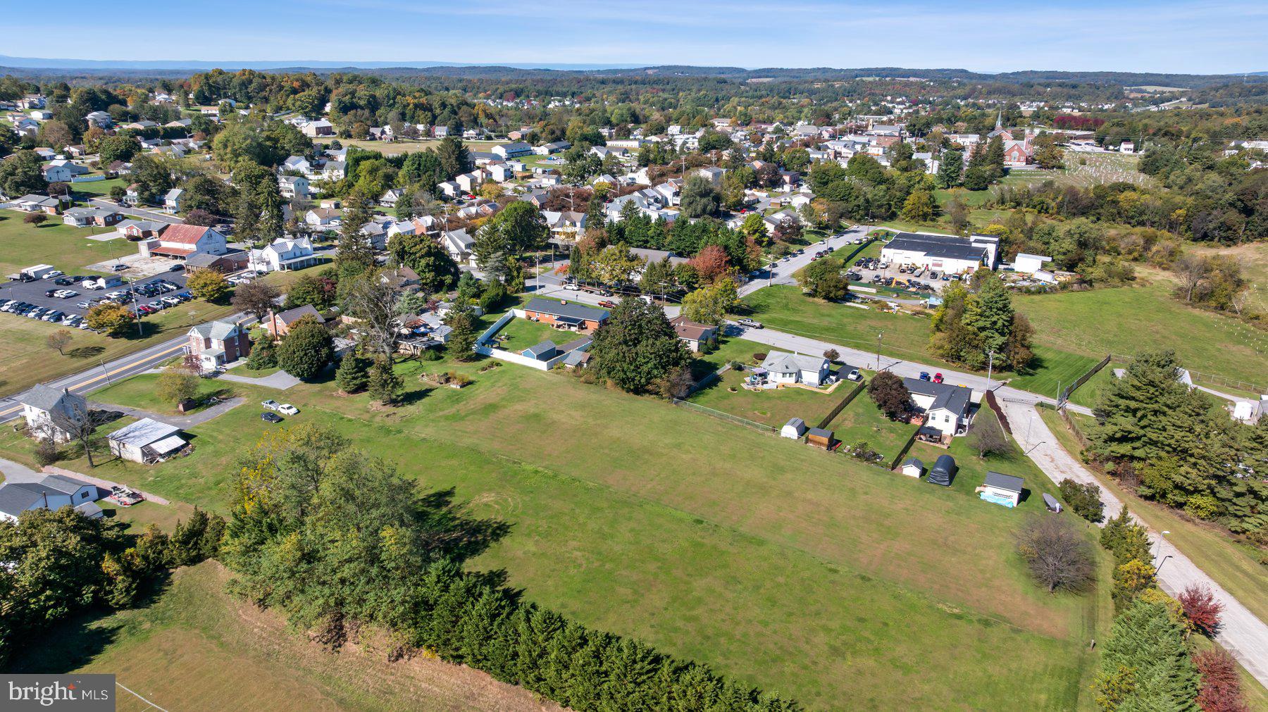 2943 Main Street Manchester, MD 21102 - Photo 12 of 43 an aerial view of residential houses with outdoor space and trees