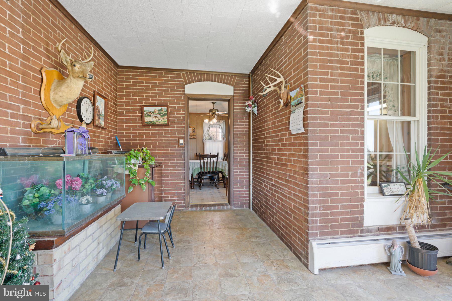 2943 Main Street Manchester, MD 21102 - Photo 15 of 43 a view of a house with a yard and sitting area