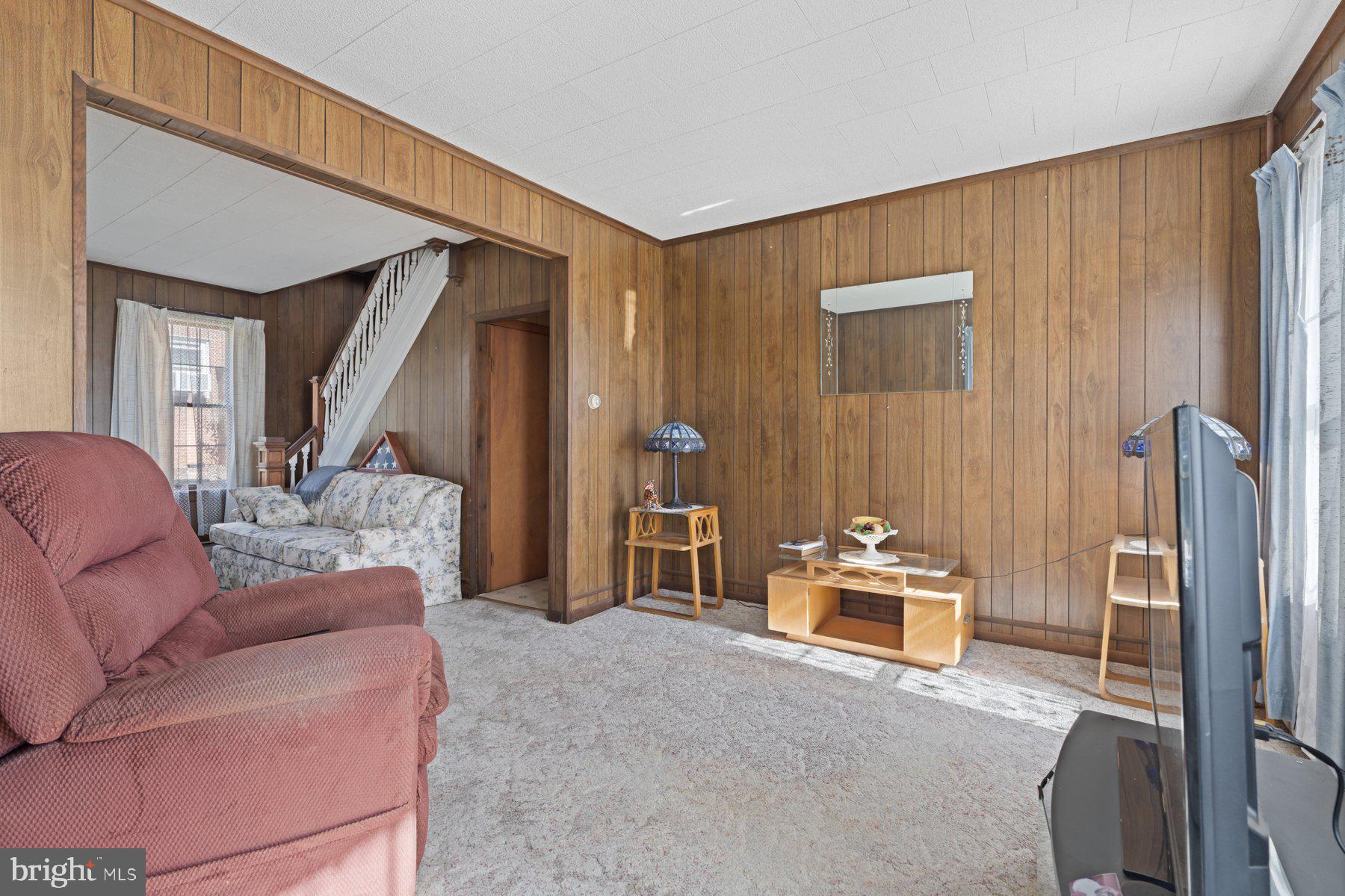 2943 Main Street Manchester, MD 21102 - Photo 22 of 43 a living room with furniture and a window