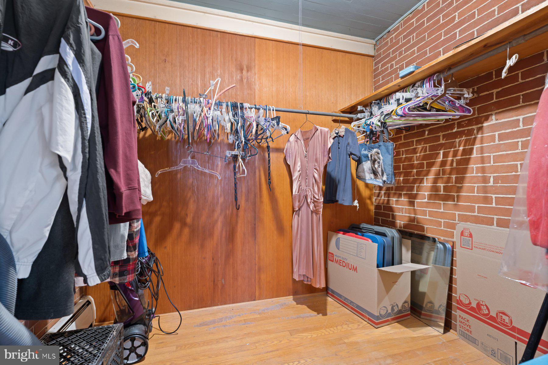 2943 Main Street Manchester, MD 21102 - Photo 29 of 43 a view of walk in closet with clothes and shoes