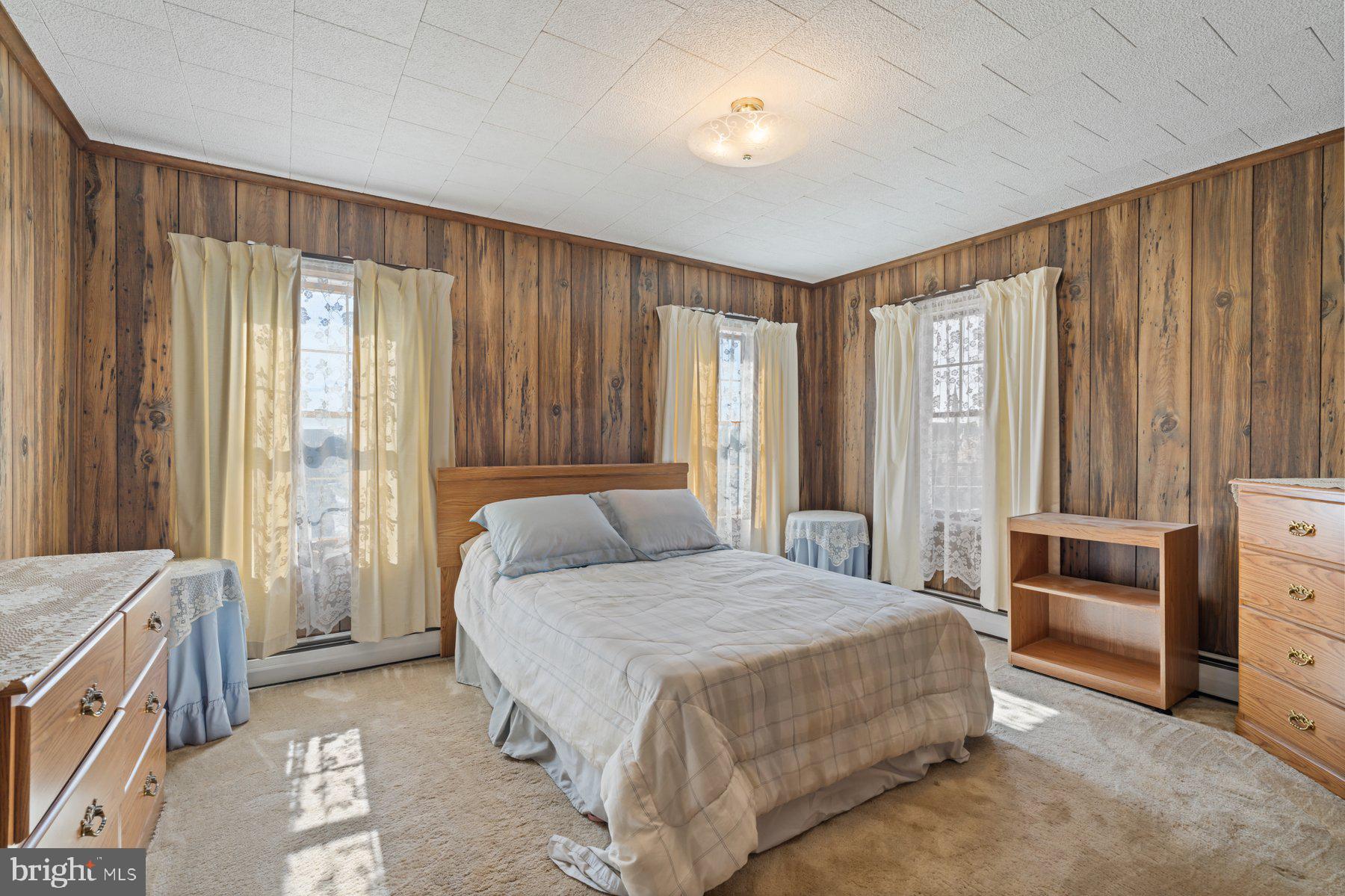 2943 Main Street Manchester, MD 21102 - Photo 37 of 43 a bedroom with a bed and a window