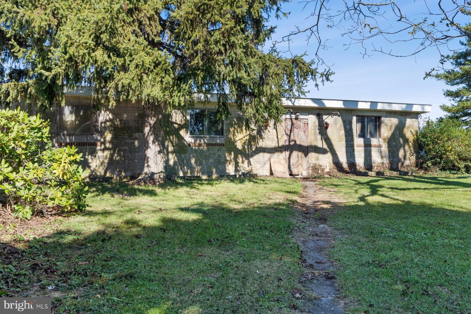2943 Main Street Manchester, MD 21102 - Photo 38 of 43 a view of a backyard with a garden