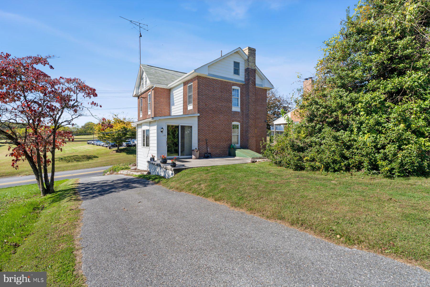 2943 Main Street Manchester, MD 21102 - Photo 5 of 43 a view of a house with backyard and a tree