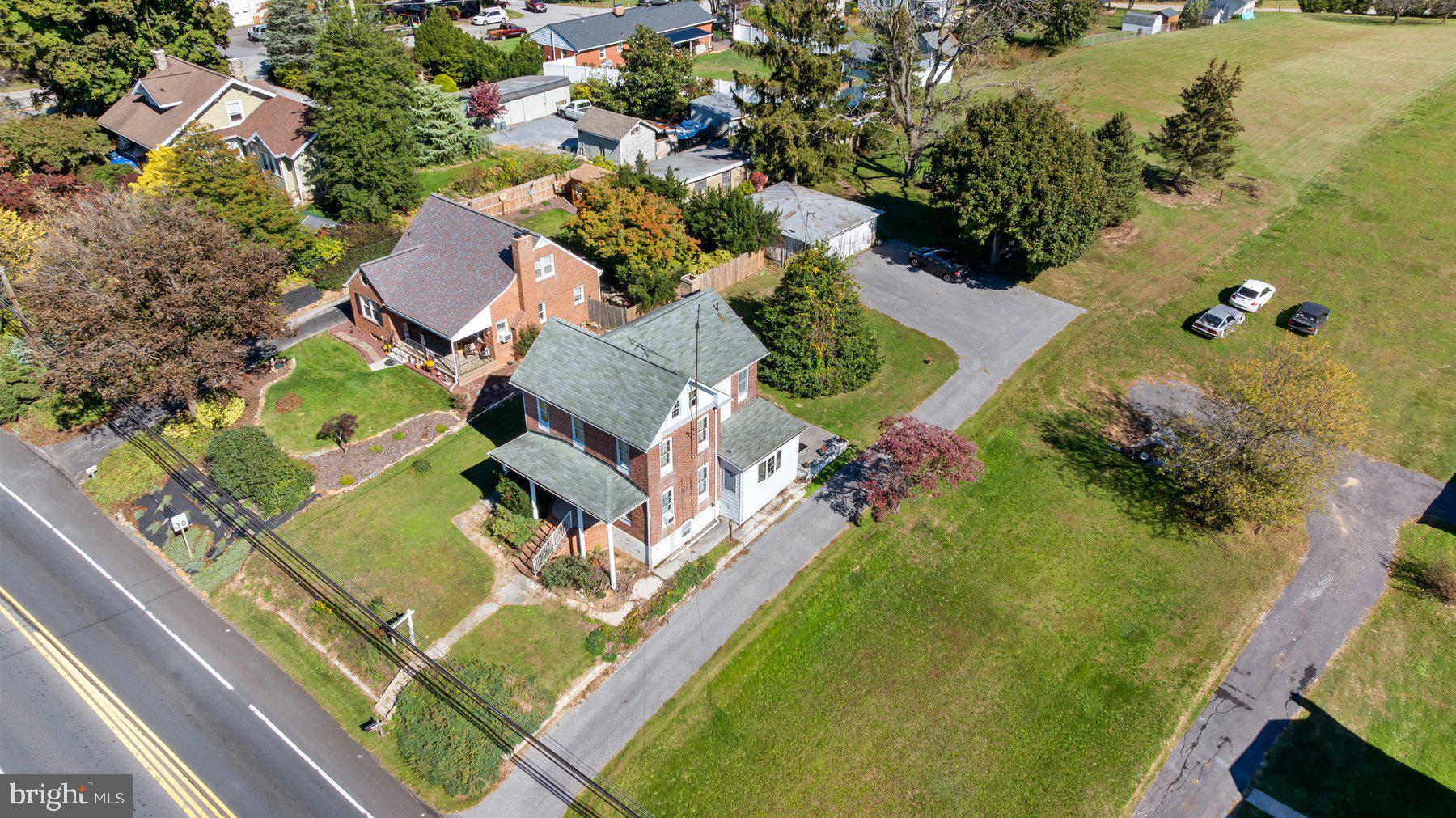 2943 Main Street Manchester, MD 21102 - Photo 8 of 43 an aerial view of a house with a garden and swimming pool